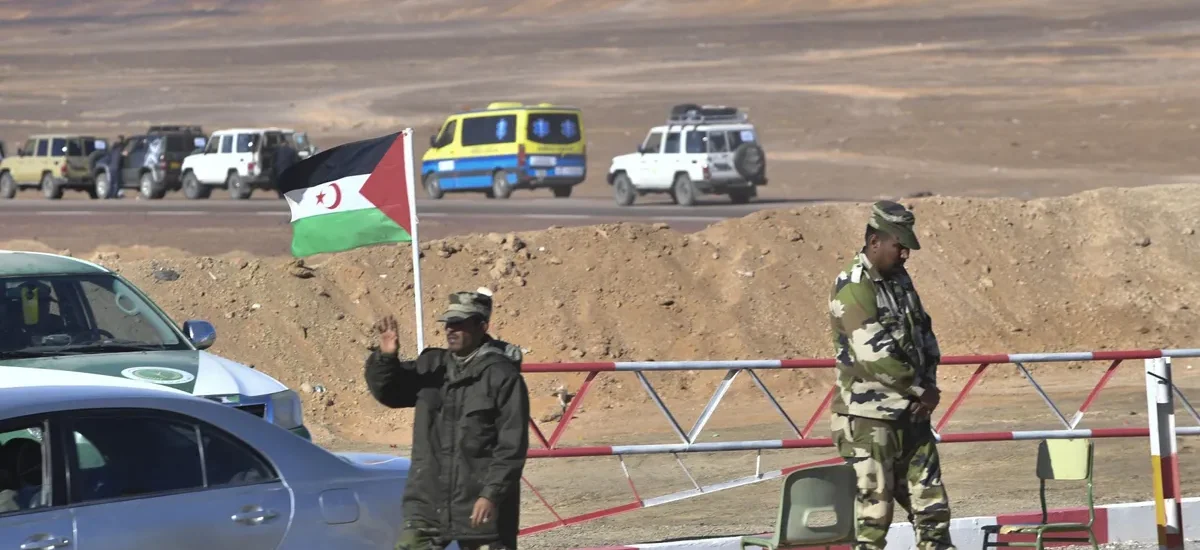 A flag of Western Sahara at a checkpoint manned by members of the Sahrawi security forces outside the refugee camp of Dakhla, Western Sahara.Photographer: Ryad Kramdi/AFP/Getty Images