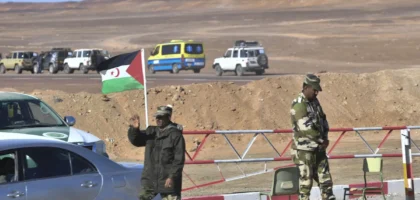 A flag of Western Sahara at a checkpoint manned by members of the Sahrawi security forces outside the refugee camp of Dakhla, Western Sahara.Photographer: Ryad Kramdi/AFP/Getty Images