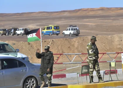 A flag of Western Sahara at a checkpoint manned by members of the Sahrawi security forces outside the refugee camp of Dakhla, Western Sahara.Photographer: Ryad Kramdi/AFP/Getty Images